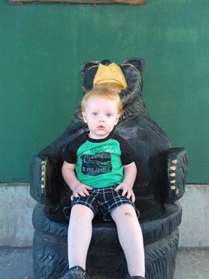 Nathan on the bear chair, he looks surprised, but I couldn’t get him to smile on demand