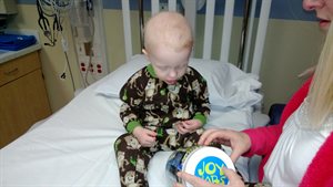 Mommy is showing Nathan his jar