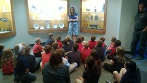 The tourguide talking about the items that were found