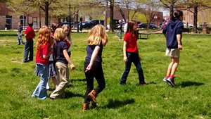 One person counts while everyone else pretends to be a statue