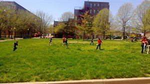 The other kids were playing kickball, but it appeared the bases were arbitrary