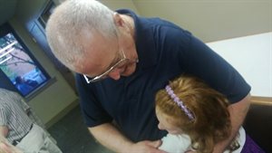 Grandpa telling Natalie how well she did