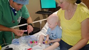 Picking out scented lip gloss, they would rub this in his gas mask to make it smell good